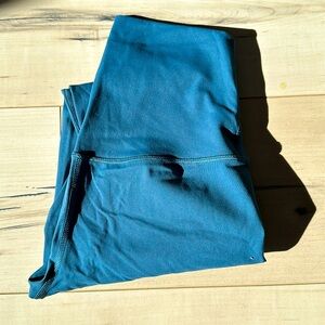 Teal 25” from inseam legggings 12” across waste so size small